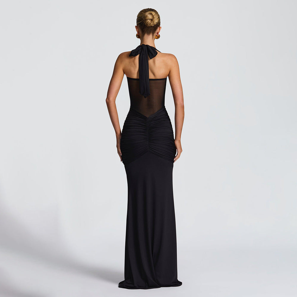 A long dress with pleated and flowing ruffles
