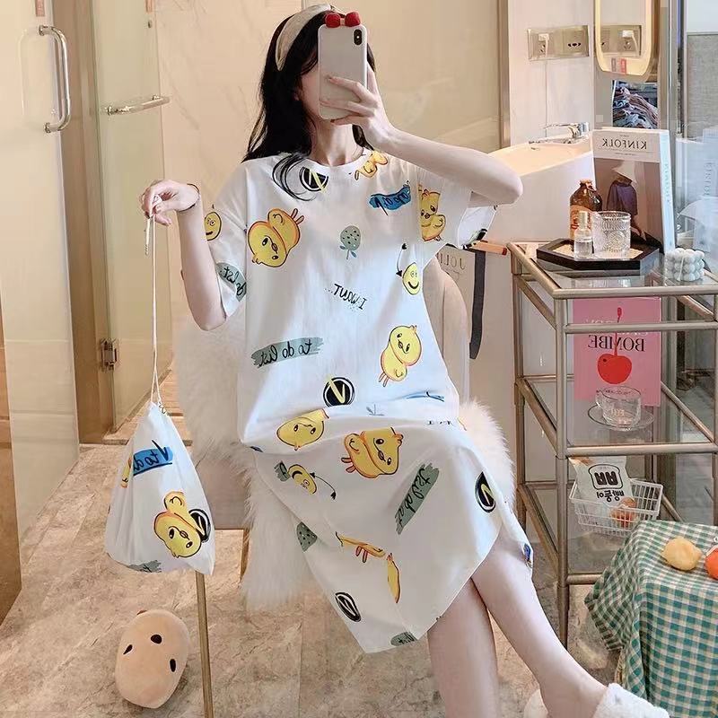 A girl in a sleeping dress with short sleeves