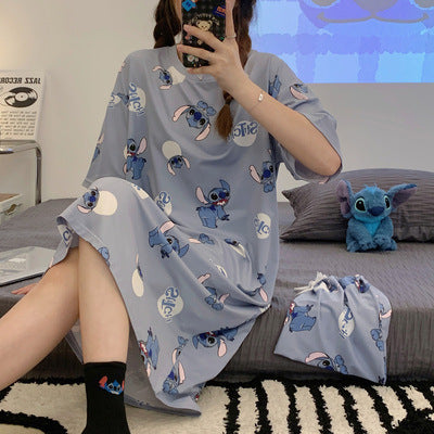 A girl in a sleeping dress with short sleeves