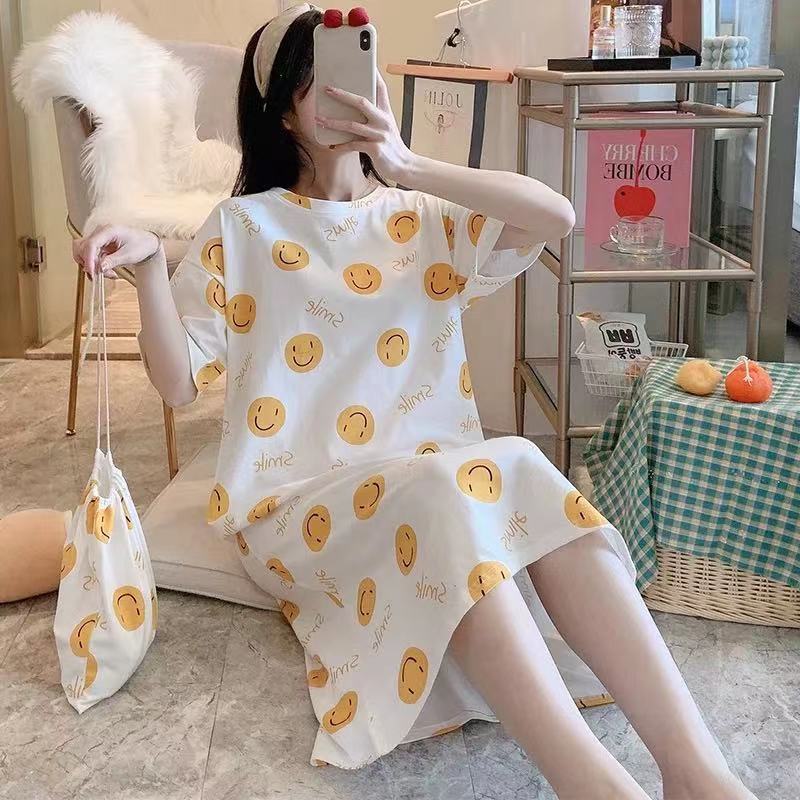 A girl in a sleeping dress with short sleeves