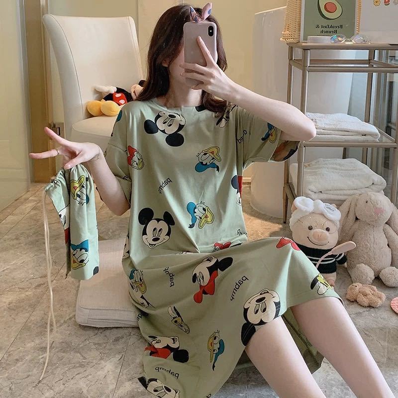 A girl in a sleeping dress with short sleeves