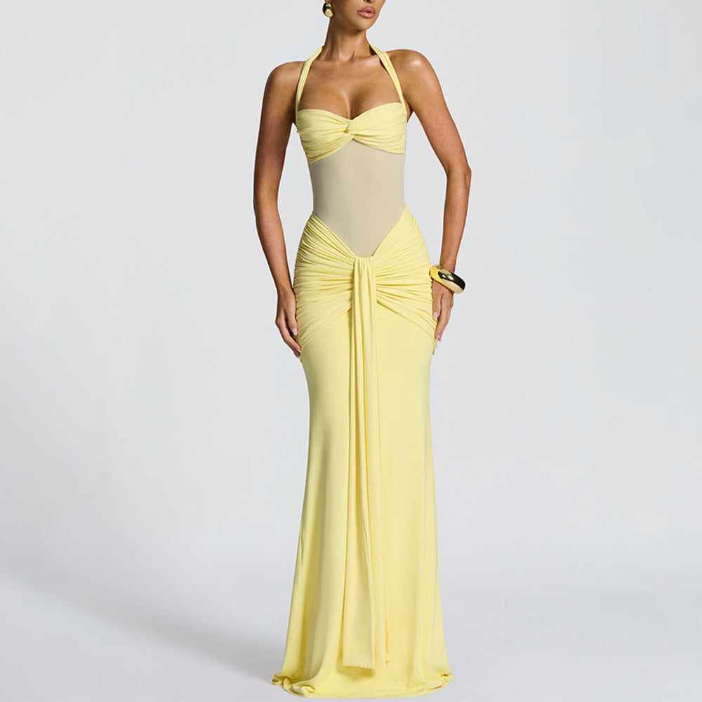 A long dress with pleated and flowing ruffles