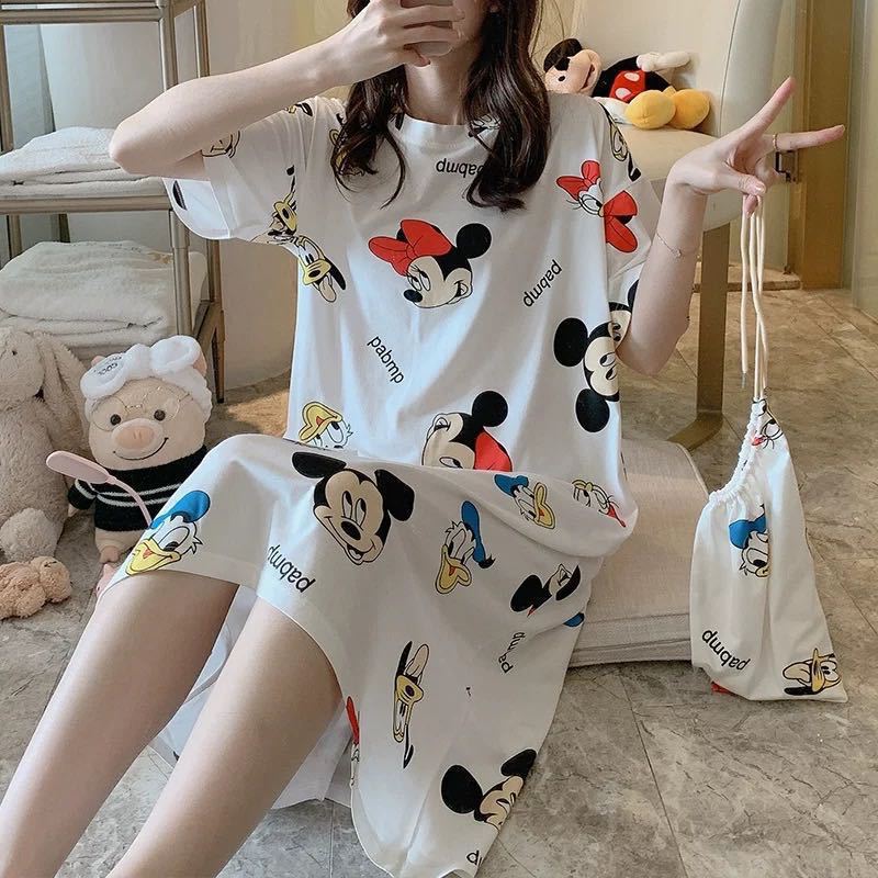 A girl in a sleeping dress with short sleeves