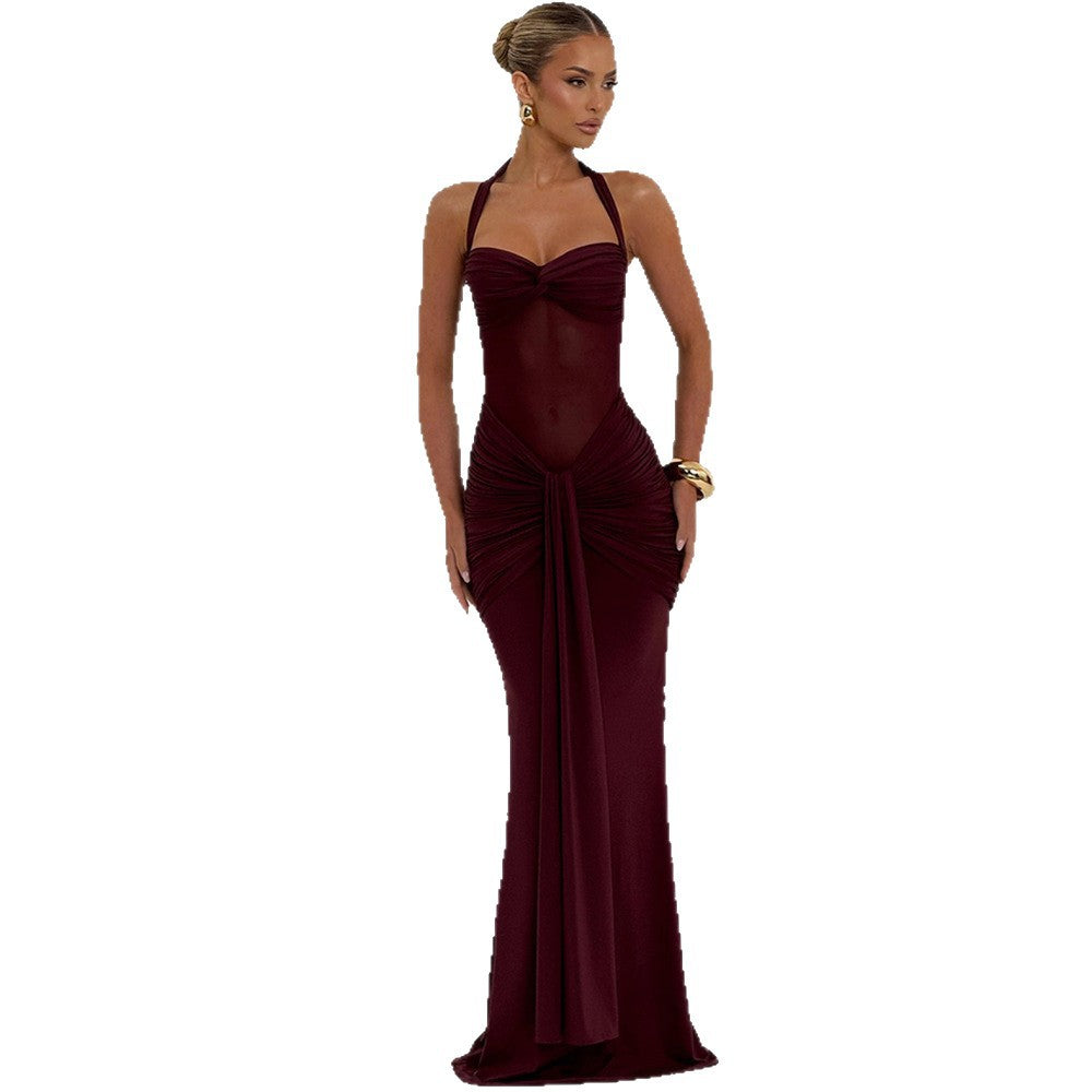 A long dress with pleated and flowing ruffles