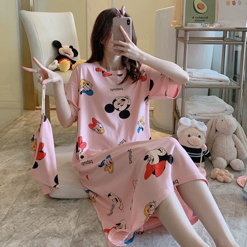 A girl in a sleeping dress with short sleeves
