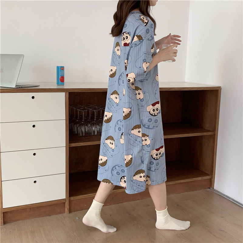 A girl in a sleeping dress with short sleeves