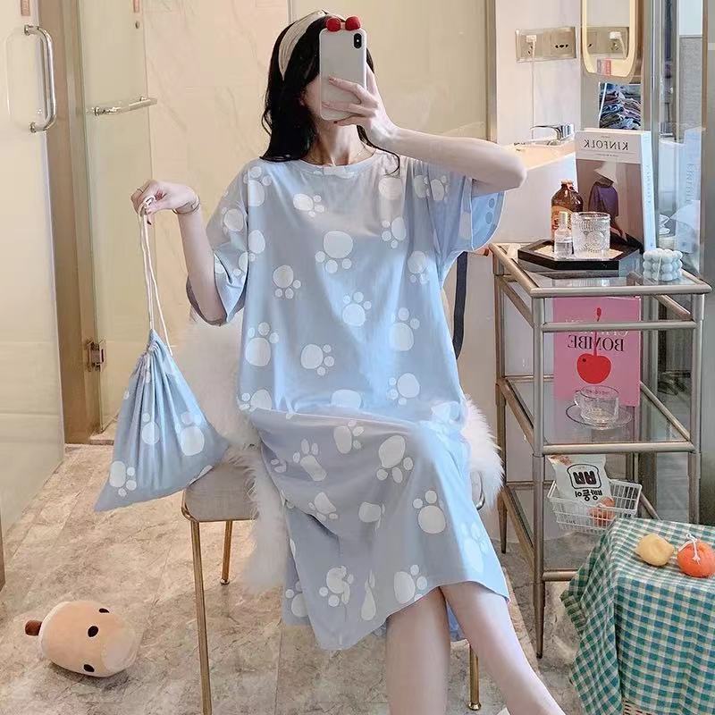 A girl in a sleeping dress with short sleeves