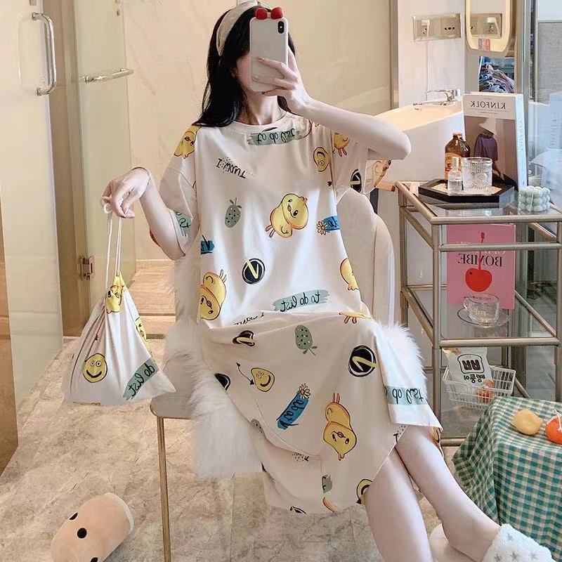 A girl in a sleeping dress with short sleeves