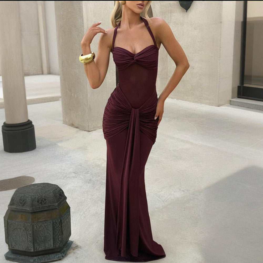 A long dress with pleated and flowing ruffles
