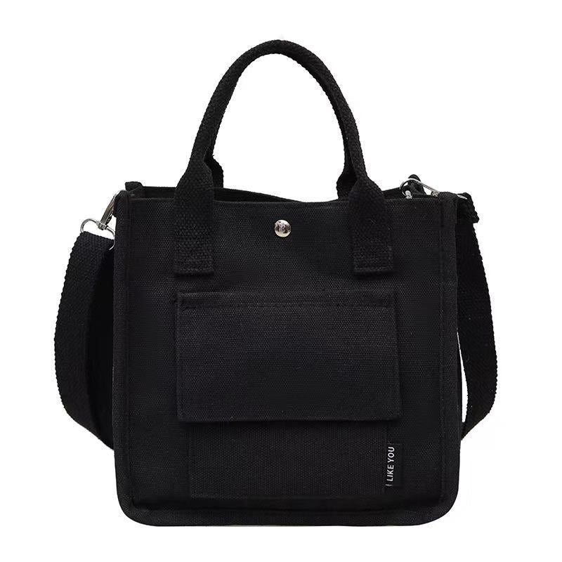 Canvas three-dimensional multi-pocket tote handbag