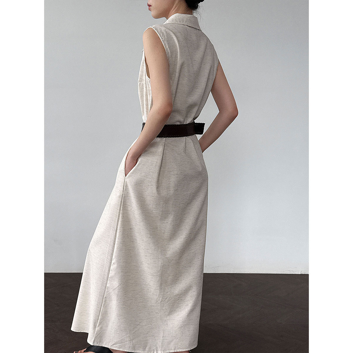 Waist-cinching sleeveless dress