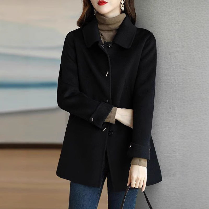 A woman wearing a woolen coat