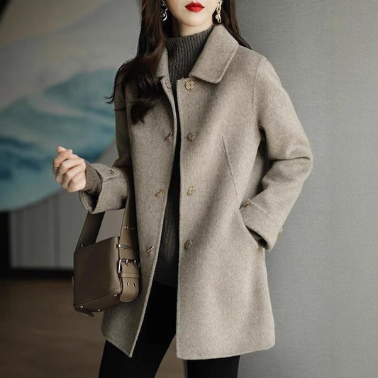 A woman wearing a woolen coat