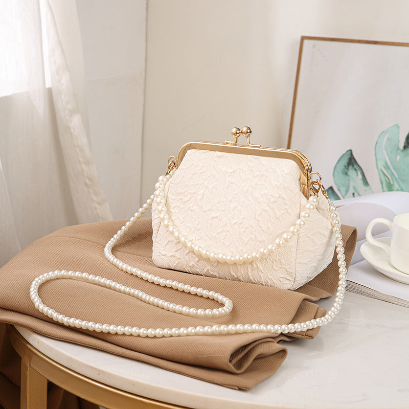 Pleated shell bag crossbody bag