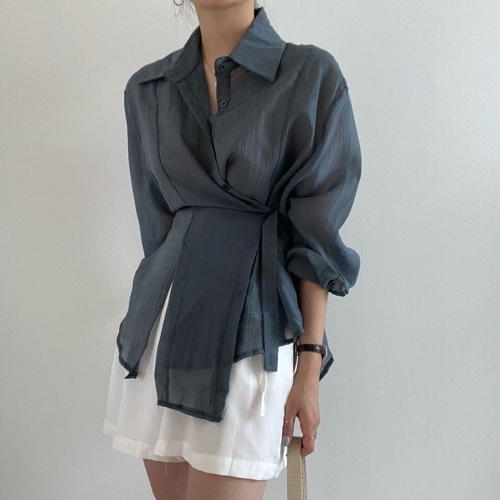 Irregularly buttoned lapel long-sleeved shirt