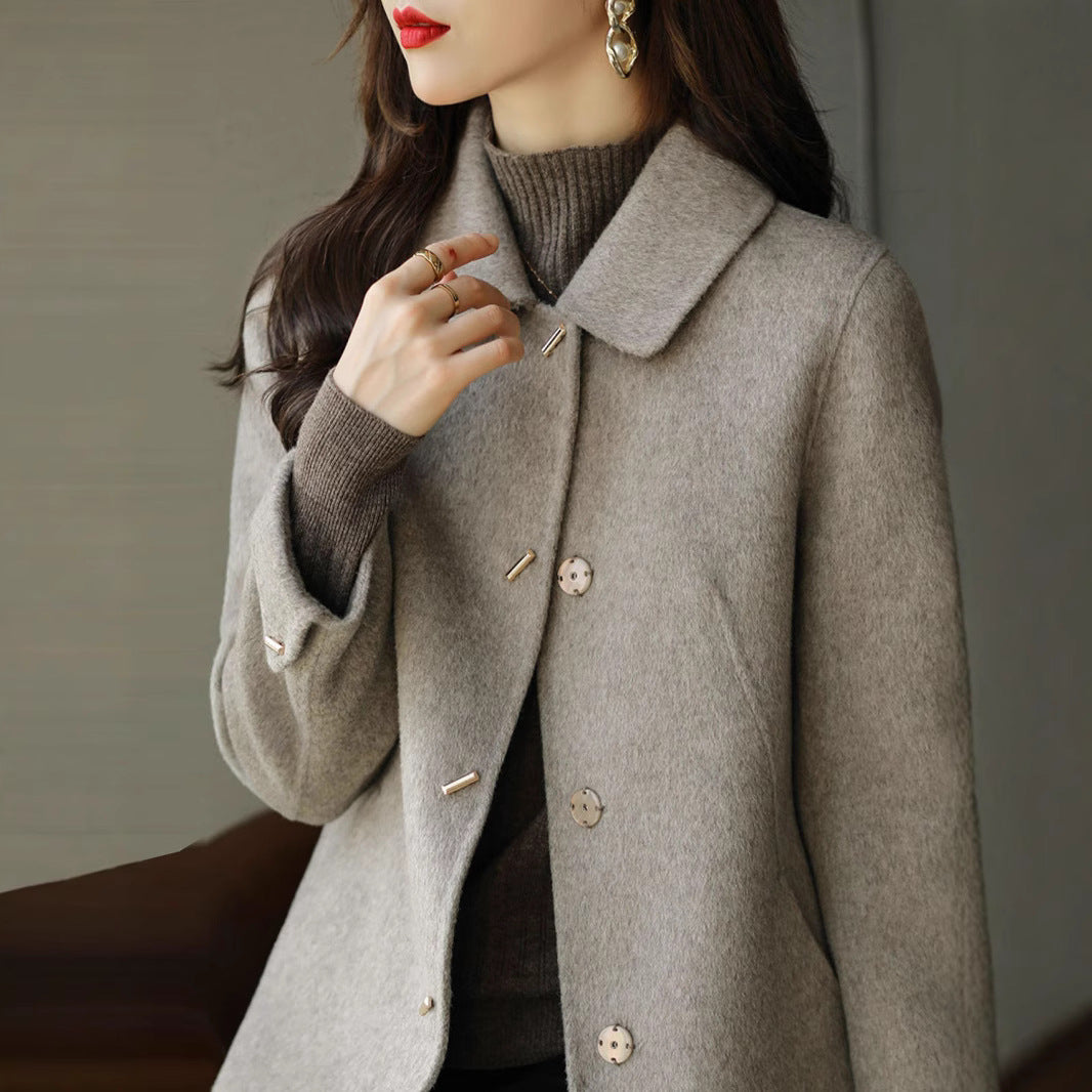 A woman wearing a woolen coat