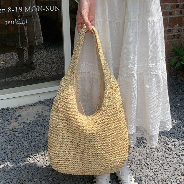 Large-capacity casual hand-held woven bag