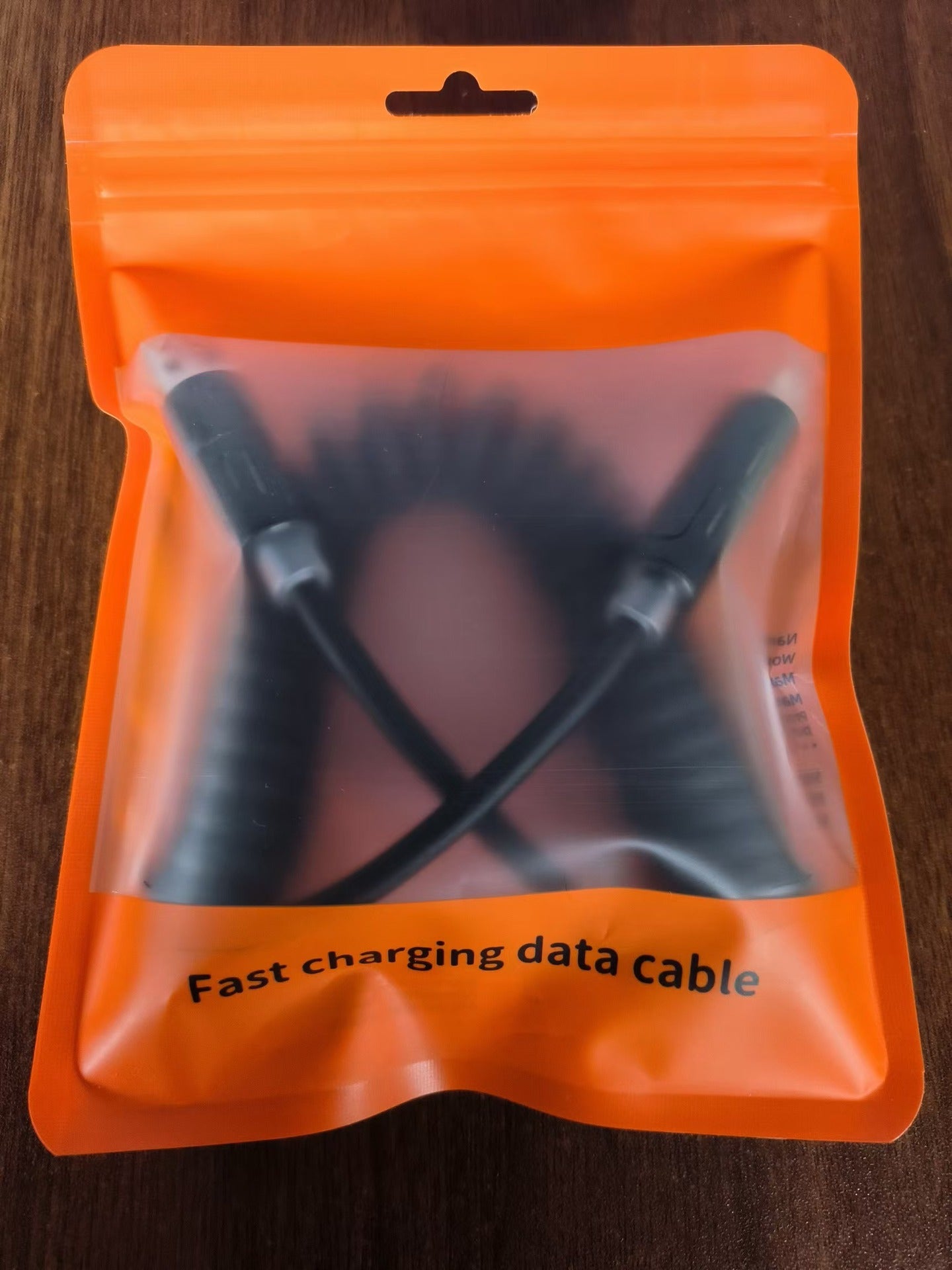 Light Beam Spring Four-in-One Mobile Phone Charging Cable