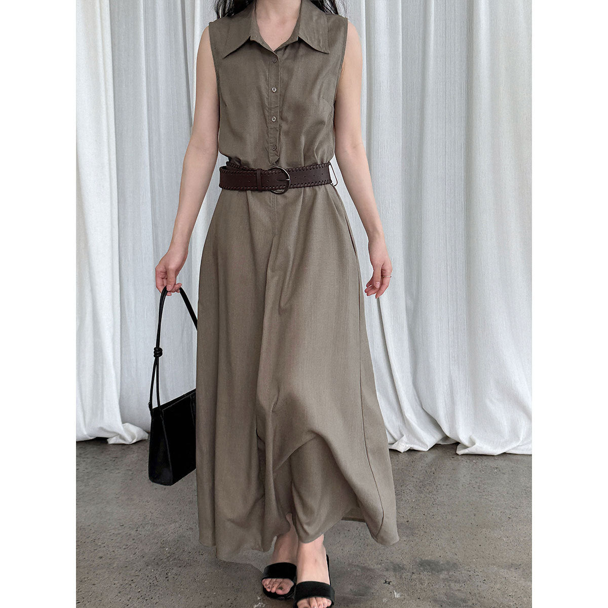 Waist-cinching sleeveless dress