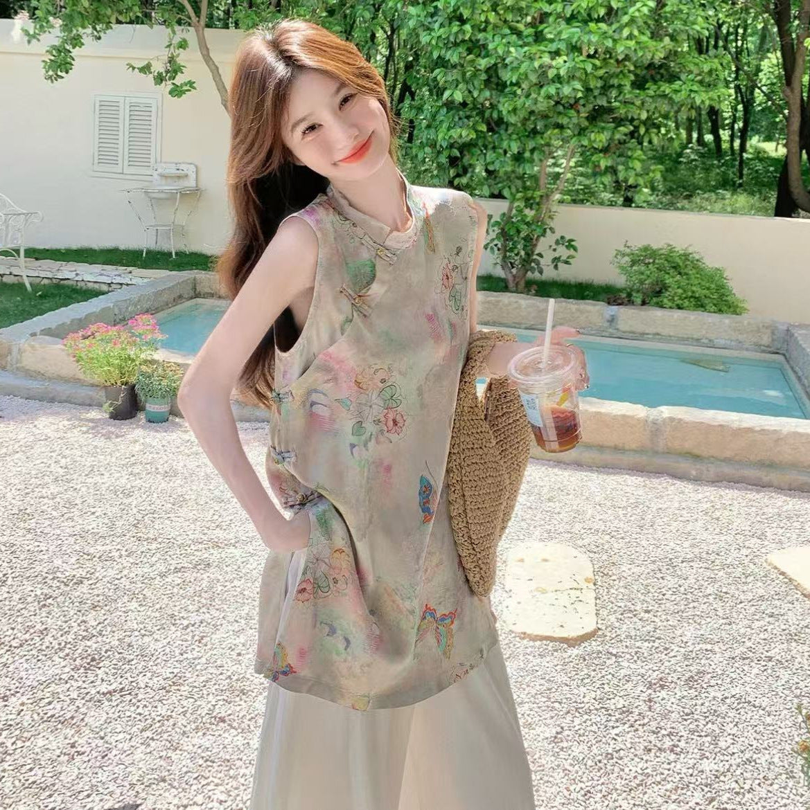 Sleeveless jacquard mid-length cheongsam