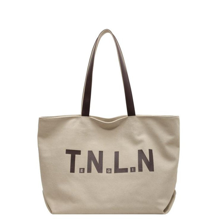 Large-capacity canvas shoulder tote bag.