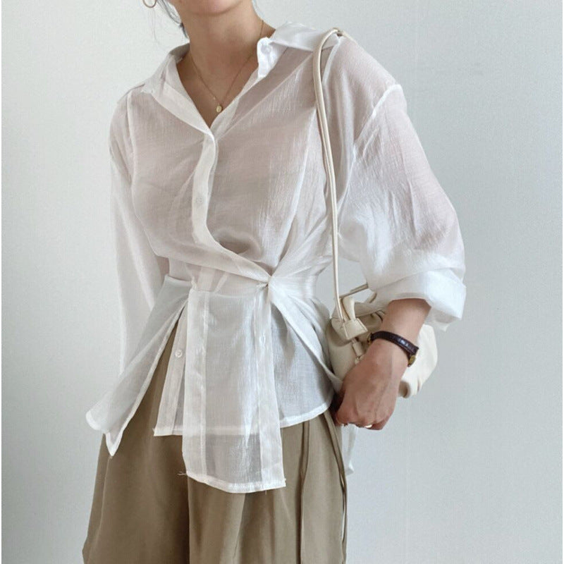 Irregularly buttoned lapel long-sleeved shirt