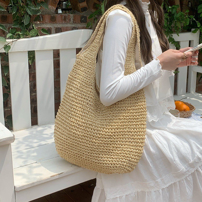 Large-capacity casual hand-held woven bag