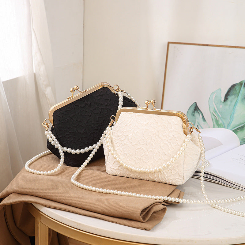 Pleated shell bag crossbody bag