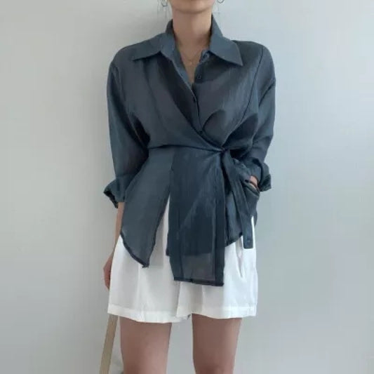 Irregularly buttoned lapel long-sleeved shirt