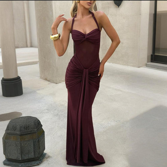 A long dress with pleated and flowing ruffles